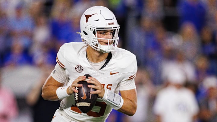 Oct 18, 2025; Lexington, Kentucky, USA; Texas Longhorns quarterback Arch Manning (16) looks for an open receiver during the first quarter against the Kentucky Wildcats at Kroger Field. Mandatory Credit: Jordan Prather-Imagn Images
