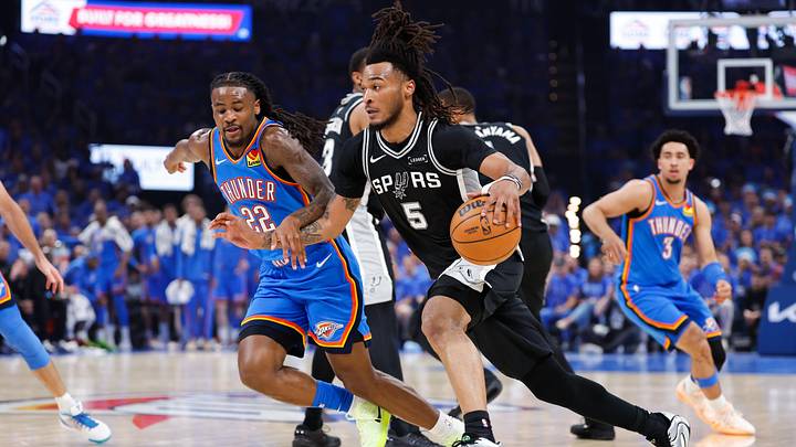 May 18, 2026; Oklahoma City, Oklahoma, USA; San Antonio Spurs guard Stephon Castle (5) drives the ball while defended by Oklahoma City Thunder guard Cason Wallace (22) in the second quarter during game one of the western conference finals for the 2026 NBA playoffs at Paycom Center. Mandatory Credit: Alonzo Adams-Imagn Images May 18, 2026; Oklahoma City, Oklahoma, USA; San Antonio Spurs guard Stephon Castle (5) drives the ball while defended by Oklahoma City Thunder guard Cason Wallace (22) in the second quarter during game one of the western conference finals for the 2026 NBA playoffs at Paycom Center. Mandatory Credit: Alonzo Adams-Imagn Images