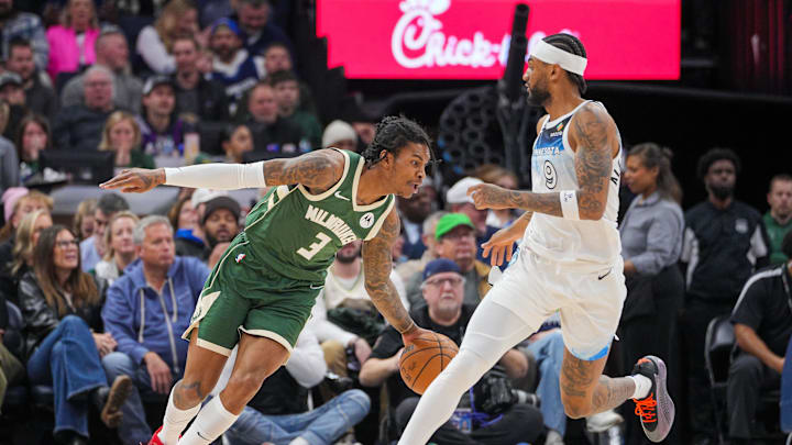Feb 12, 2025; Minneapolis, Minnesota, USA; Milwaukee Bucks guard Kevin Porter Jr. (3) dribbles against the Minnesota Timberwolves guard Nickeil Alexander-Walker (9) in the fourth quarter at Target Center. Mandatory Credit: Brad Rempel-Imagn Images Feb 12, 2025; Minneapolis, Minnesota, USA; Milwaukee Bucks guard Kevin Porter Jr. (3) dribbles against the Minnesota Timberwolves guard Nickeil Alexander-Walker (9) in the fourth quarter at Target Center. Mandatory Credit: Brad Rempel-Imagn Images