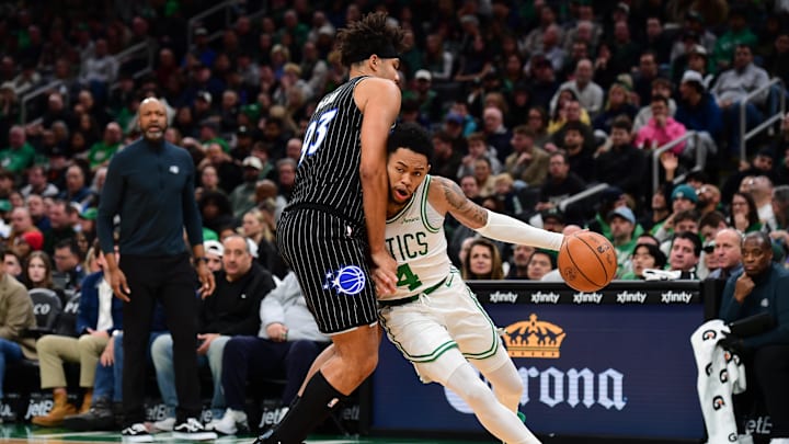 Nov 23, 2025; Boston, Massachusetts, USA; Orlando Magic forward Noah Penda (93) defends Boston Celtics guard Anfernee Simons (4) during the second half at TD Garden. Mandatory Credit: Bob DeChiara-Imagn Images Nov 23, 2025; Boston, Massachusetts, USA; Orlando Magic forward Noah Penda (93) defends Boston Celtics guard Anfernee Simons (4) during the second half at TD Garden. Mandatory Credit: Bob DeChiara-Imagn Images