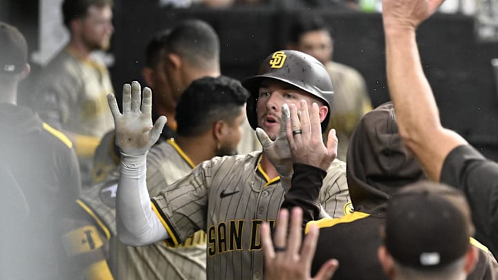 Sep 20, 2025; Chicago, Illinois, USA;  San Diego Padres outfielder Jackson Merrill (3) celebrates in the dugout after his home run during the second inning against the Chicago White Sox at Rate Field. Mandatory Credit: Matt Marton-Imagn Images