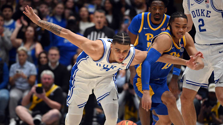 Jan 7, 2025; Durham, North Carolina, USA; Duke Blue Devils guard Tyrese Proctor (5) and Pittsburgh Panthers guard Jaland Lowe (15) battle for a loose ball during the first half at Cameron Indoor Stadium. Mandatory Credit: Rob Kinnan-Imagn Images Jan 7, 2025; Durham, North Carolina, USA; Duke Blue Devils guard Tyrese Proctor (5) and Pittsburgh Panthers guard Jaland Lowe (15) battle for a loose ball during the first half at Cameron Indoor Stadium. Mandatory Credit: Rob Kinnan-Imagn Images