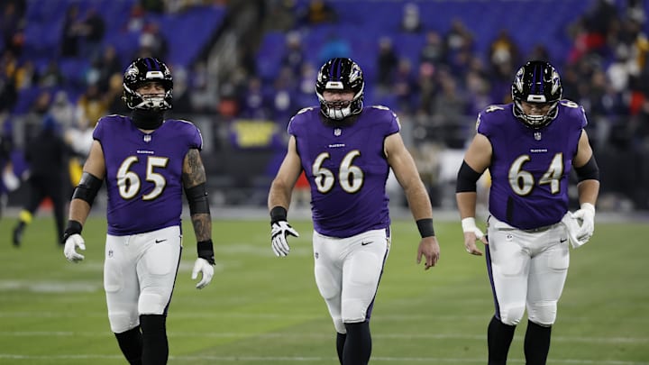 Jan 11, 2025; Baltimore, Maryland, USA; Baltimore Ravens guard Patrick Mekari (65) and guard Ben Cleveland (66) and center Tyler Linderbaum (64) up before an AFC wild card game against the Pittsburgh Steelers at M&T Bank Stadium. Mandatory Credit: Geoff Burke-Imagn Images Jan 11, 2025; Baltimore, Maryland, USA; Baltimore Ravens guard Patrick Mekari (65) and guard Ben Cleveland (66) and center Tyler Linderbaum (64) up before an AFC wild card game against the Pittsburgh Steelers at M&T Bank Stadium. Mandatory Credit: Geoff Burke-Imagn Images