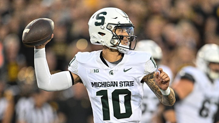 Sep 30, 2023; Iowa City, Iowa, USA; Michigan State Spartans quarterback Noah Kim (10) throws a pass against the Iowa Hawkeyes during the first quarter at Kinnick Stadium. Mandatory Credit: Jeffrey Becker-Imagn Images