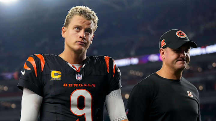 Cincinnati Bengals quarterback Joe Burrow (9) and head coach Zac Taylor head for the locker room after the fourth quarter of the NFL Week 3 game between the Cincinnati Bengals and the Washington Commanders at Paycor Stadium in downtown Cincinnati on Monday, Sept. 23, 2024. The Bengals remain winless after a 38-33 loss to Washington. Cincinnati Bengals quarterback Joe Burrow (9) and head coach Zac Taylor head for the locker room after the fourth quarter of the NFL Week 3 game between the Cincinnati Bengals and the Washington Commanders at Paycor Stadium in downtown Cincinnati on Monday, Sept. 23, 2024. The Bengals remain winless after a 38-33 loss to Washington.