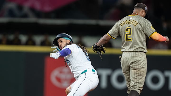 Seattle Mariners shortstop J.P. Crawford (3) celebrates at second base after hitting a two-run double during the sixth inning against the San Diego Padres at T-Mobile Park in 2024.