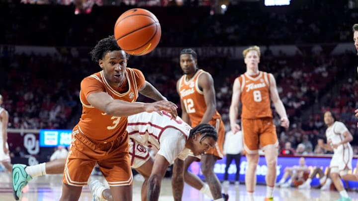 Texas' Dailyn Swain (3) tries to save a ball from out of bounds in the second half of the men's college basketball game between the Oklahoma Sooners and the Texas Longhorns at Lloyd Noble Center in Norman, Okla., Saturday Jan. 31, 2026.