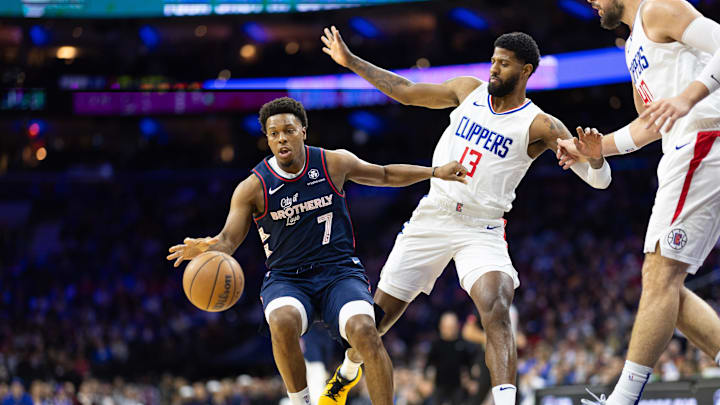 Mar 27, 2024; Philadelphia, Pennsylvania, USA; Philadelphia 76ers guard Kyle Lowry (7) controls the ball against LA Clippers forward Paul George (13) during the first quarter at Wells Fargo Center. Mandatory Credit: Bill Streicher-USA TODAY Sports