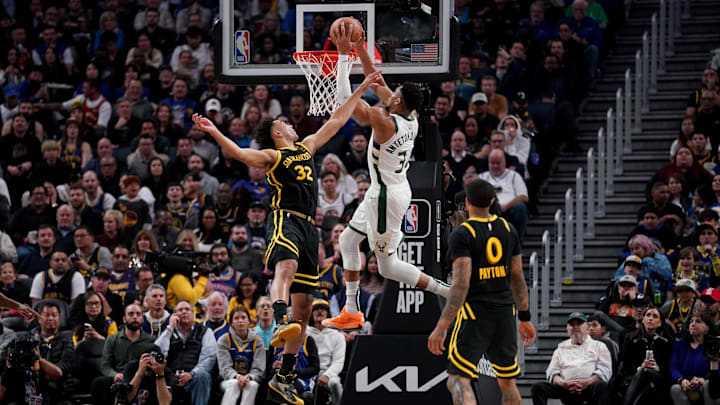 Mar 6, 2024; San Francisco, California, USA; Milwaukee Bucks forward Giannis Antetokounmpo (34) dunks the ball over Golden State Warriors forward Trayce Jackson-Davis (32) in the third quarter at the Chase Center. Mandatory Credit: Cary Edmondson-Imagn Images Mar 6, 2024; San Francisco, California, USA; Milwaukee Bucks forward Giannis Antetokounmpo (34) dunks the ball over Golden State Warriors forward Trayce Jackson-Davis (32) in the third quarter at the Chase Center. Mandatory Credit: Cary Edmondson-Imagn Images