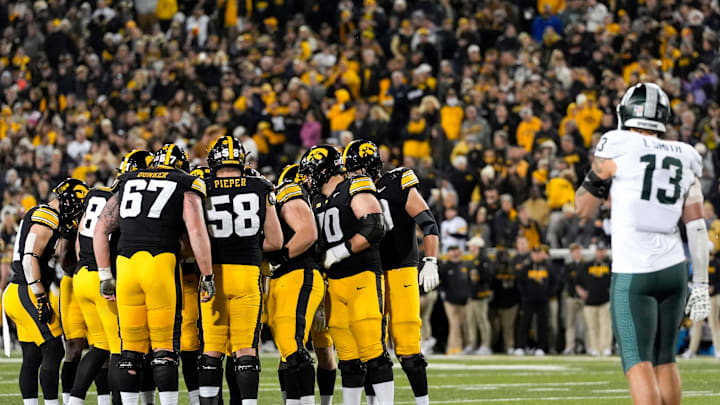 The Iowa Hawkeyes huddles in the redzone against the Michigan State Spartans Nov. 22, 2025 at Kinnick Stadium in Iowa City, Iowa.