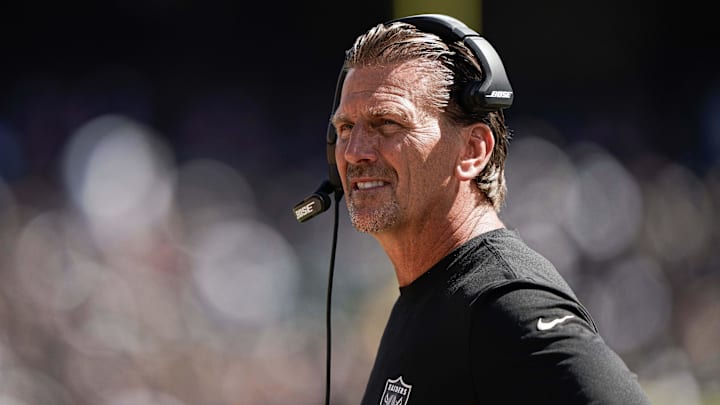Sep 15, 2019; Oakland, CA, USA; Oakland Raiders offensive coordinator Greg Olson watches the game against the Kansas City Chiefs during the first quarter at the Oakland Coliseum. Mandatory Credit: Stan Szeto-Imagn Images Sep 15, 2019; Oakland, CA, USA; Oakland Raiders offensive coordinator Greg Olson watches the game against the Kansas City Chiefs during the first quarter at the Oakland Coliseum. Mandatory Credit: Stan Szeto-Imagn Images
