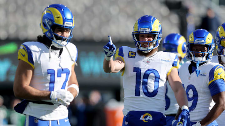 Dec 22, 2024; East Rutherford, New Jersey, USA; Los Angeles Rams wide receiver Cooper Kupp (10) points in the direction of wide receiver Puka Nacua (17) during warm ups before a game against the New York Jets at MetLife Stadium. Mandatory Credit: Brad Penner-Imagn Images Dec 22, 2024; East Rutherford, New Jersey, USA; Los Angeles Rams wide receiver Cooper Kupp (10) points in the direction of wide receiver Puka Nacua (17) during warm ups before a game against the New York Jets at MetLife Stadium. Mandatory Credit: Brad Penner-Imagn Images