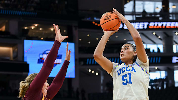 Mar 27, 2026; Sacramento, CA, USA; UCLA Bruins center Lauren Betts (51) shoots against Minnesota Golden Gophers center Sophie Hart (52) during a Sweet Sixteen game of the Sacramento Regional 2 of the women's 2026 NCAA Tournament at Golden 1 Center. Mandatory Credit: Ed Szczepanski-Imagn Images