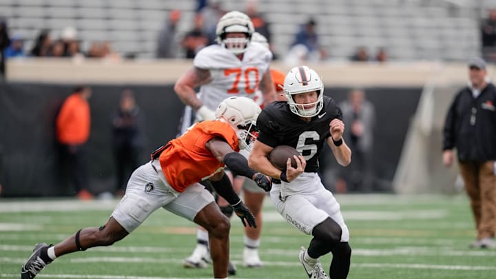 Oklahoma State quarterback Zane Flores (6) runs the ball during an Oklahoma State spring football showcase at Boone Pickens Stadium in Stillwater, Okla., Saturday, April 19, 2025.