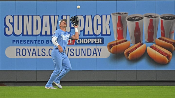 May 10, 2025; Kansas City, Missouri, USA;  Kansas City Royals right fielder Hunter Renfroe (16) catches a fly b all in the eighth inning against the Boston Red Sox at Kauffman Stadium. Mandatory Credit: Peter Aiken-Imagn Images