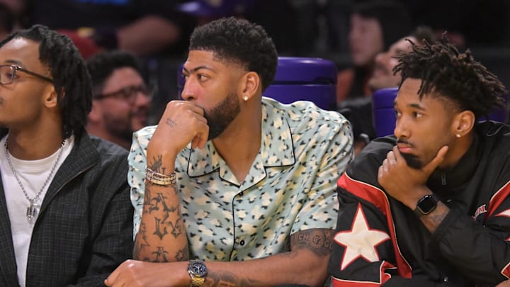 Mar 30, 2026; Los Angeles, California, USA; Washington Wizards forward Anthony Davis (23), center, looks on from the bench during the first half against the Los Angeles Lakers at Crypto.com Arena. Mandatory Credit: Jayne Kamin-Oncea-Imagn Images