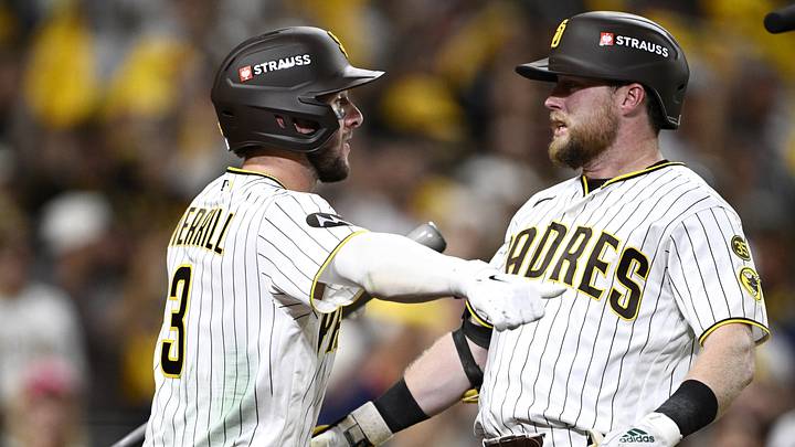Oct 6, 2026; San Diego, California, USA; San Diego Padres second baseman Jake Cronenworth (9) celebrates with San Diego Padres center fielder Jackson Merrill (3) after hitting a solo home run during the fifth inning against the Milwaukee Brewers in game three of the NLDS for the 2026 MLB Playoffs at Petco Park. Mandatory Credit: Denis Poroy-Imagn Images Oct 6, 2026; San Diego, California, USA; San Diego Padres second baseman Jake Cronenworth (9) celebrates with San Diego Padres center fielder Jackson Merrill (3) after hitting a solo home run during the fifth inning against the Milwaukee Brewers in game three of the NLDS for the 2026 MLB Playoffs at Petco Park. Mandatory Credit: Denis Poroy-Imagn Images