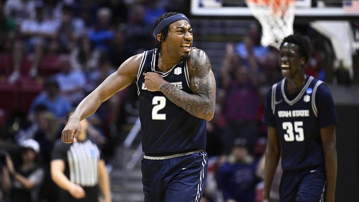 Mar 20, 2026; San Diego, CA, USA; Utah State Aggies guard Mj Collins (2) reacts in the second half against the Villanova Wildcats during a first round game of the men's 2026 NCAA Tournament at Viejas Arena. Mandatory Credit: Denis Poroy-Imagn Images