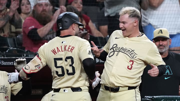 Sep 10, 2024; Phoenix, Arizona, USA; Arizona Diamondbacks first base Christian Walker (53) celebrates with Joc Pederson (3) after hitting a solo home run against the Texas Rangers in the first inning at Chase Field. Mandatory Credit: Rick Scuteri-Imagn Images