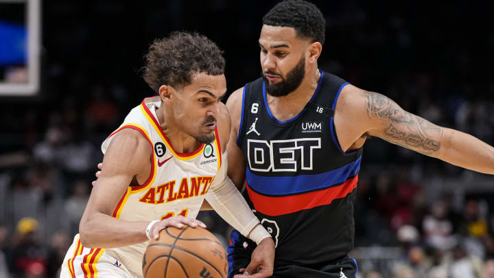 Mar 21, 2023; Atlanta, Georgia, USA; Atlanta Hawks guard Trae Young (11) dribbles defended by Mar 21, 2023; Atlanta, Georgia, USA; Atlanta Hawks guard Trae Young (11) dribbles defended by