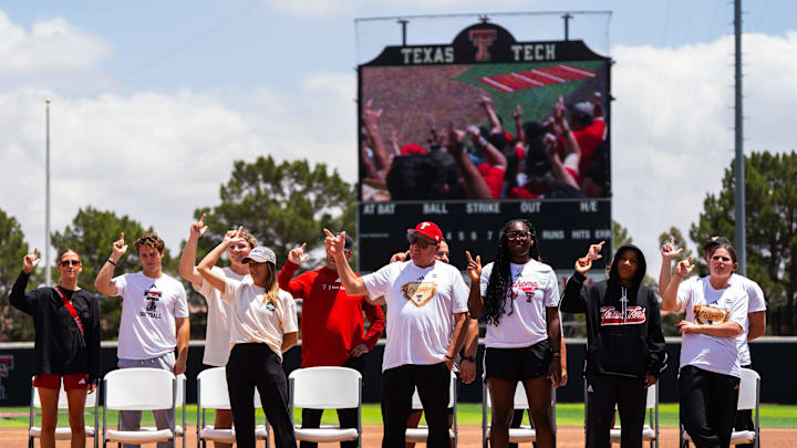 Texas Tech players and staff sing The Matador Song during a welcome back event for the Red Raider softball team at Rocky Johnson Field in Lubbock, Texas, on Friday, June 7, 2025.