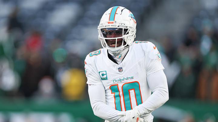 Jan 5, 2025; East Rutherford, New Jersey, USA; Miami Dolphins wide receiver Tyreek Hill (10) on the field before the game against the New York Jets at MetLife Stadium. Mandatory Credit: Vincent Carchietta-Imagn Images