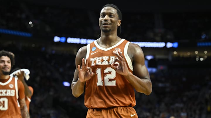 Mar 19, 2026; Portland, OR, USA; Texas Longhorns guard Tramon Mark (12) celebrates after making a basket in the first half against the BYU Cougars during a first round game of the men's 2026 NCAA Tournament at Moda Center. Mandatory Credit: Craig Strobeck-Imagn Images