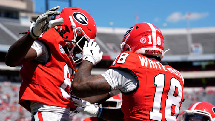 Georgia wide receiver Sacovie White (18) celebrates with his teammates after scoring a touchdown during the Georgia G-Day spring football game in Athens, Ga., on Saturday, April 12, 2025.