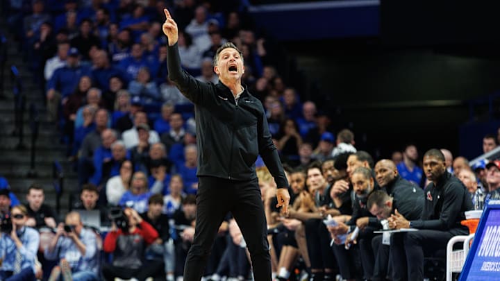 Nov 20, 2023; Lexington, Kentucky, USA; Saint Joseph's Hawks head coach Billy Lange yells to his players during the first half against the Kentucky Wildcats at Rupp Arena at Central Bank Center. Mandatory Credit: Jordan Prather-Imagn Images