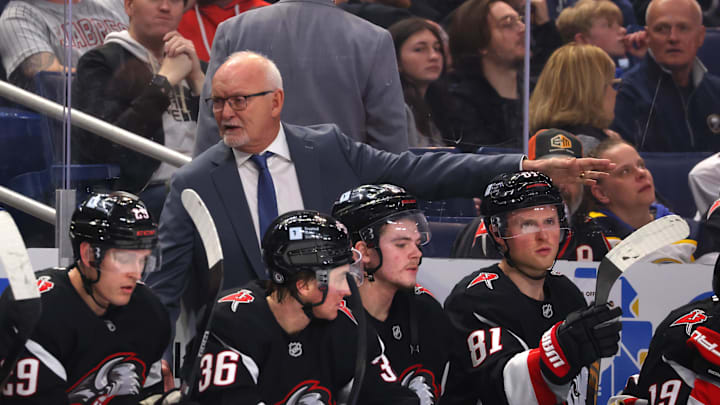 Apr 5, 2025; Buffalo, New York, USA;  Buffalo Sabres head coach Lindy Ruff talks to his team during the second period against the Tampa Bay Lightning at KeyBank Center. Mandatory Credit: Timothy T. Ludwig-Imagn Images
