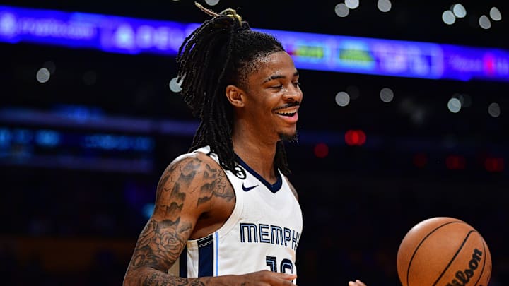 January 20, 2023; Los Angeles, California, USA; Memphis Grizzlies guard Ja Morant (12) reacts against the Los Angeles Lakers during the second half at Crypto.com Arena. Mandatory Credit: Gary A. Vasquez-USA TODAY Sports