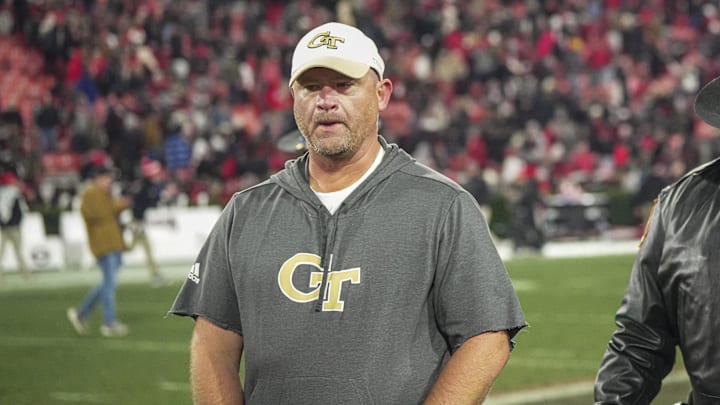 Nov 29, 2024; Athens, Georgia, USA; Georgia Tech Yellow Jackets head coach Brent Key  leaves the field after Georgia Tech was defeated by the Georgia Bulldogs in eight overtimes at Sanford Stadium. Mandatory Credit: Dale Zanine-Imagn Images