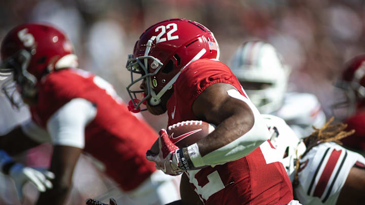 Oct 12, 2024; Tuscaloosa, Alabama, USA;  Alabama Crimson Tide running back Justice Haynes (22) runs the ball agains the South Carolina Gamecocks during the first quarter at Bryant-Denny Stadium. Mandatory Credit: Will McLelland-Imagn Images