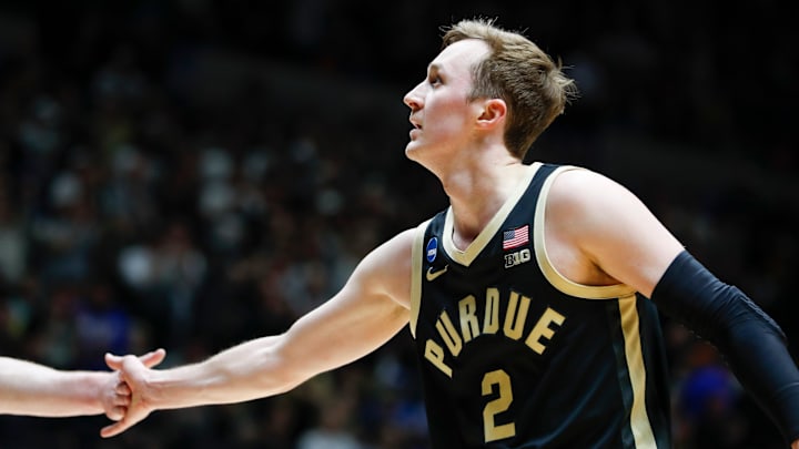 Purdue Boilermakers guard Fletcher Loyer (2) high-fives Purdue Boilermakers guard Braden Smith (3) 