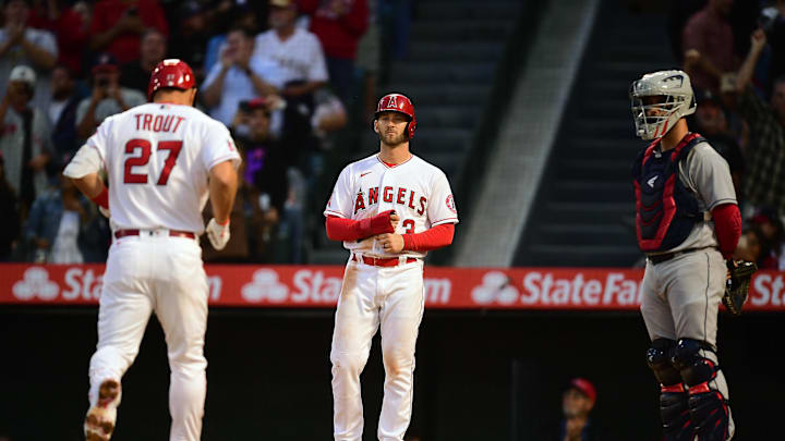 Apr 26, 2022; Anaheim, California, USA; Los Angeles Angels center fielder Mike Trout (27) is greeted by right fielder Taylor Ward (3) after hitting a two run home run against the Cleveland Guardians during the third inning at Angel Stadium. Mandatory Credit: Gary A. Vasquez-Imagn Images