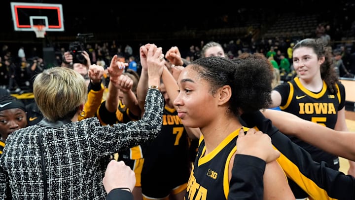 The Iowa Hawkeyes huddle at half court after defeating the Oregon Ducks 74-66 Jan. 15, 2026 at Carver-Hawkeye Arena in Iowa City, Iowa.