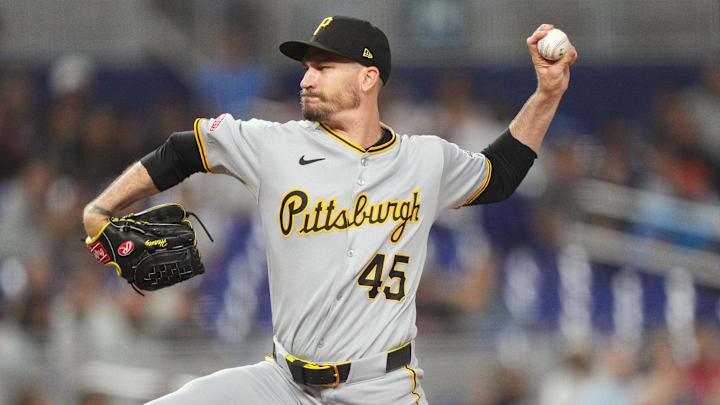 Mar 28, 2025; Miami, Florida, USA;  Pittsburgh Pirates pitcher Andrew Heaney (45) pitches in the first inning against the Miami Marlins at loanDepot Park. Mandatory Credit: Jim Rassol-Imagn Images