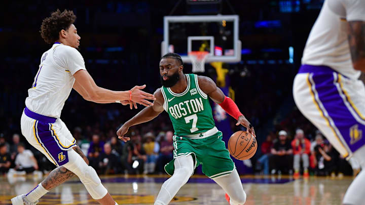 Dec 25, 2023; Los Angeles, California, USA; Boston Celtics guard Jaylen Brown (7) moves the ball against Los Angeles Lakers center Jaxson Hayes (11) during the second half at Crypto.com Arena. Mandatory Credit: Gary A. Vasquez-Imagn Images Dec 25, 2023; Los Angeles, California, USA; Boston Celtics guard Jaylen Brown (7) moves the ball against Los Angeles Lakers center Jaxson Hayes (11) during the second half at Crypto.com Arena. Mandatory Credit: Gary A. Vasquez-Imagn Images
