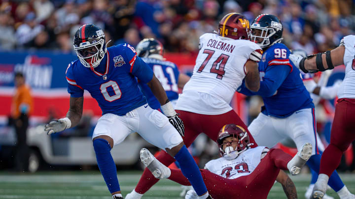 New York Giants linebacker Brian Burns (0) rushes past the offensive line during a game between the New York Giants and the Washington Commanders at MetLife Stadium in East Rutherford on Sunday, Nov. 3, 2024. New York Giants linebacker Brian Burns (0) rushes past the offensive line during a game between the New York Giants and the Washington Commanders at MetLife Stadium in East Rutherford on Sunday, Nov. 3, 2024.