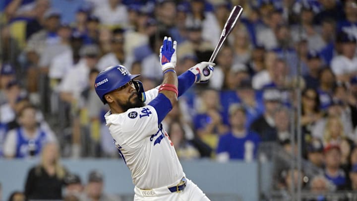 Oct 26, 2024; Los Angeles, California, USA; Los Angeles Dodgers outfielder Teoscar Hernandez (37) hits a two run home run in the third inning against the New York Yankees during game two of the 2024 MLB World Series at Dodger Stadium. Mandatory Credit: Jayne Kamin-Oncea-Imagn Images