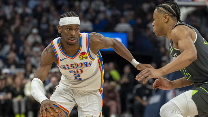 Feb 23, 2025; Minneapolis, Minnesota, USA; Oklahoma City Thunder guard Shai Gilgeous-Alexander (2) dribbles the ball past Minnesota Timberwolves guard Jaylen Clark (22) in the first half at Target Center. Mandatory Credit: Jesse Johnson-Imagn Images Feb 23, 2025; Minneapolis, Minnesota, USA; Oklahoma City Thunder guard Shai Gilgeous-Alexander (2) dribbles the ball past Minnesota Timberwolves guard Jaylen Clark (22) in the first half at Target Center. Mandatory Credit: Jesse Johnson-Imagn Images