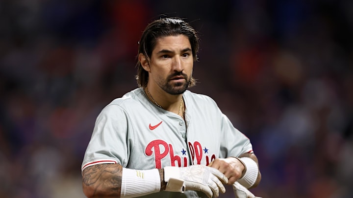 Oct 8, 2024; New York City, New York, USA; Philadelphia Phillies outfielder Nick Castellanos (8) reacts in the eighth inning against the New York Mets during game three of the NLDS for the 2024 MLB Playoffs at Citi Field. Mandatory Credit: Vincent Carchietta-Imagn Images
