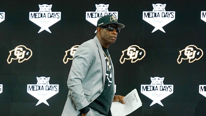 Jul 9, 2025; Frisco, TX, USA; Colorado head coach Deion Sanders walks onto the stage during 2025 Big 12 Football Media Days at The Star. Mandatory Credit: Raymond Carlin III-Imagn Images