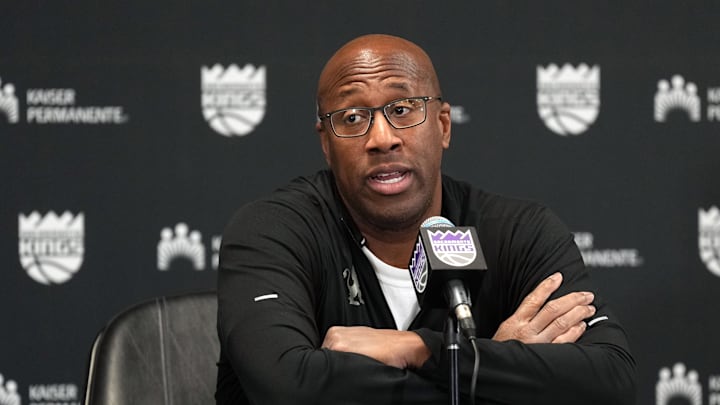 Dec 8, 2024; Sacramento, California, USA; Sacramento Kings head coach Mike Brown talks with media members before the game against the Utah Jazz at Golden 1 Center. Mandatory Credit: Darren Yamashita-Imagn Images