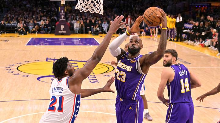 Feb 5, 2026; Los Angeles, California, USA; Los Angeles Lakers forward LeBron James (23) drives past Philadelphia 76ers center Joel Embiid (21) in the second half at Crypto.com Arena. Mandatory Credit: Jayne Kamin-Oncea-Imagn Images Feb 5, 2026; Los Angeles, California, USA; Los Angeles Lakers forward LeBron James (23) drives past Philadelphia 76ers center Joel Embiid (21) in the second half at Crypto.com Arena. Mandatory Credit: Jayne Kamin-Oncea-Imagn Images