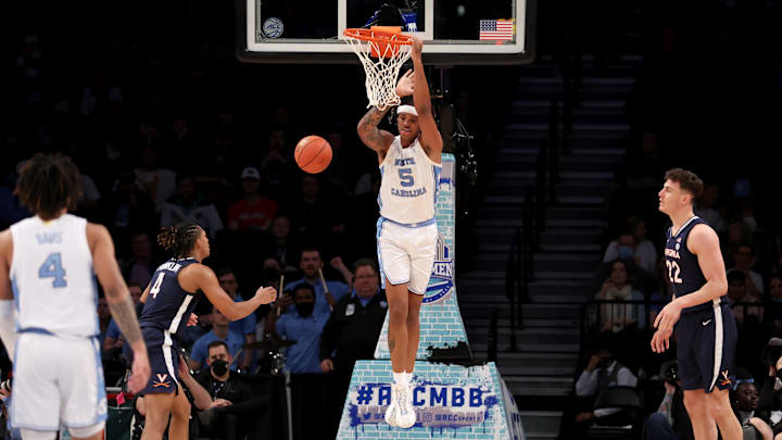 Mar 10, 2022; Brooklyn, NY, USA; North Carolina Tar Heels forward Armando Bacot (5) hangs on the rim