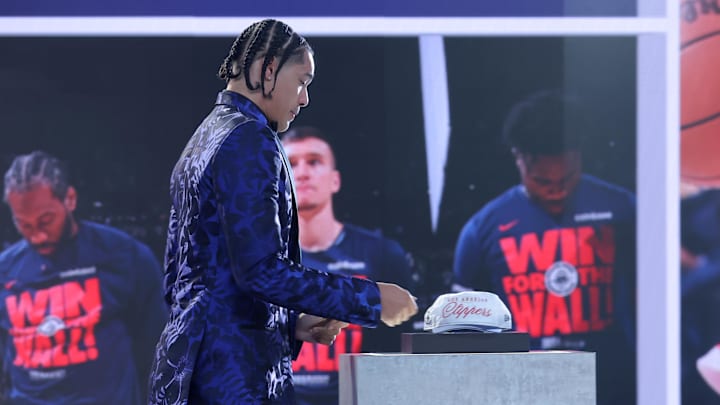 Jun 25, 2025; Brooklyn, NY, USA;  Yanic Konan Niederhauser walks on stage after being selected as the 30th pick by the Los Angeles Clippers in the first round of the 2025 NBA Draft at Barclays Center. Mandatory Credit: Brad Penner-Imagn Images