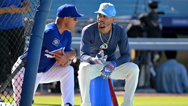Sep 20, 2025; Los Angeles, California, USA;  Los Angeles Dodgers manager Dave Roberts (30) and Los Angeles Dodgers shortstop Mookie Betts (50) talks during batting practice prior to the game against the San Francisco Giants at Dodger Stadium. Mandatory Credit: Jayne Kamin-Oncea-Imagn Images