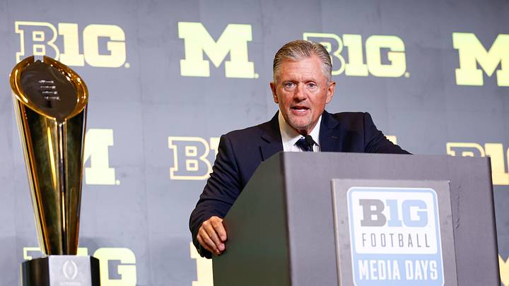 Jul 30, 2026; Chicago, IL, USA; Michigan Football head coach Kyle Whittingham speaks during Big Ten Media Days at Hilton Chicago. Mandatory Credit: Kamil Krzaczynski-Imagn Images Jul 30, 2026; Chicago, IL, USA; Michigan Football head coach Kyle Whittingham speaks during Big Ten Media Days at Hilton Chicago. Mandatory Credit: Kamil Krzaczynski-Imagn Images