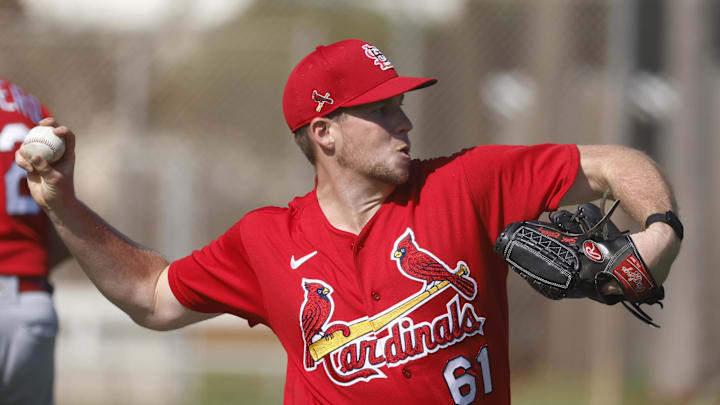Feb 25, 2021; St. Louis Cardinals pitcher Seth Elledge (61) throws during spring training workouts Feb 25, 2021; St. Louis Cardinals pitcher Seth Elledge (61) throws during spring training workouts